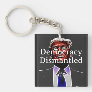 Sleutelhanger 'Democratie ontmanteld'