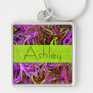 Sleutelhanger met neon paarse en groene spiralen e
