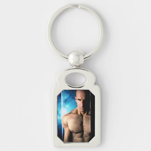 Sleutelhangers van metaal met de tekst 'Step Out' (Voorkant)