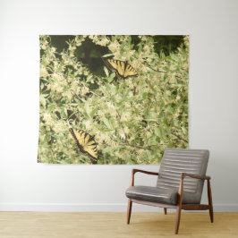 Slib-vlinders op bloeiende struikgewas wandkleed