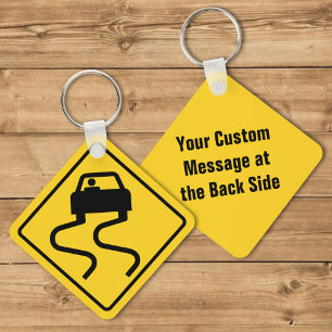 Slippery Road wanneer nat Sleutelhanger