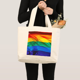 SlipperyJoe's gay pride vlag zwaaiend rood oranje  Grote Tote Bag