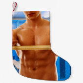 SlipperyJoe's gespierde man shirtloze borst 6-pack Kleine Kerstsok (Voorkant)