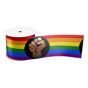 SlipperyJoe's regenboogkleuren vlag opgeheven vuis Lint