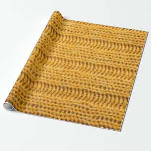 Sluit de geel gebreide getextureerde achtergrond. cadeaupapier