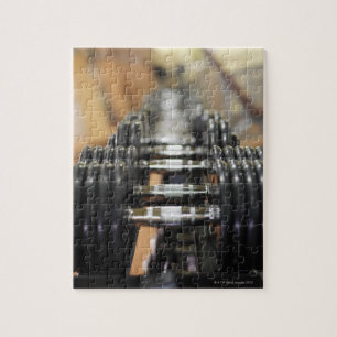 Sluiting van een rij dumbels legpuzzel