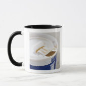 Sluiting van koffie mok (Links)