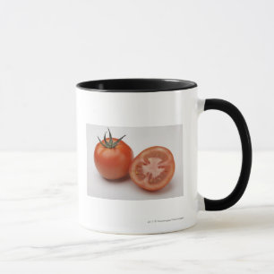 Sluiting van twee tomaten mok