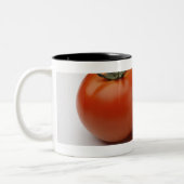 Sluiting van twee tomaten tweekleurige koffiemok (Links)