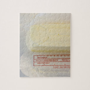 Sluiting van verse boter legpuzzel