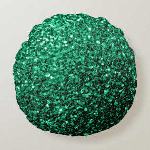 Smaragdgroene nepschittertjes glinsteren rond kussen