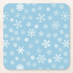 Sneeuw op lichte blauwe achtergrond vierkante kartonnen onderzetter