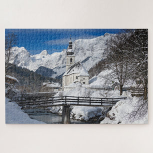 Sneeuwkerk met alpenbergen legpuzzel