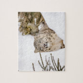 Sneeuwluipaard in de sneeuw legpuzzel (Verticaal)