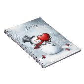 Sneeuwman biedt liefde met een groot hart notitieboek (Rechterzijde)