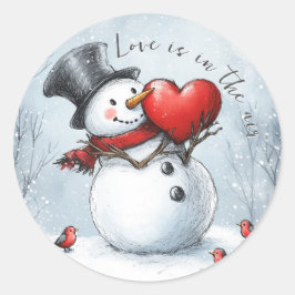 Sneeuwman biedt liefde met een groot hart ronde sticker