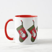 Sneeuwman die Kerstmiskousen rondom hangt Mok (Links)