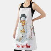 Sneeuwman glimlachend in de sneeuw voor leuke kers schort (Insitu)