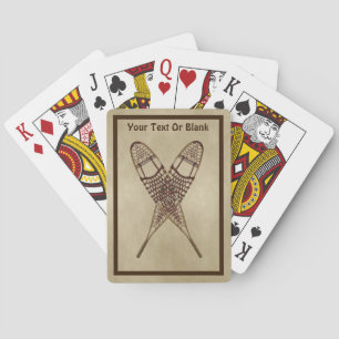 Sneeuwschoenen op oud papier pokerkaarten