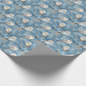 Sneeuwuilen op blauw cadeaupapier (Hoek)
