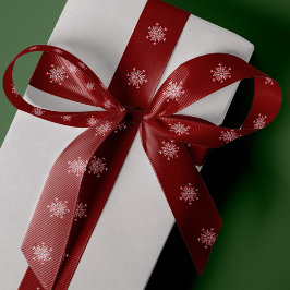 Sneeuwvlokken elegante rode kerstcadeauverpakking lint