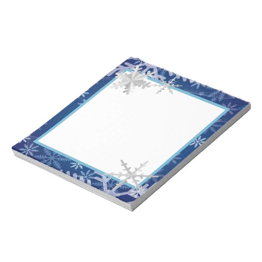 Sneeuwvlokken in blauw notitieblok (Gedraaid)