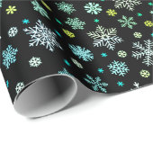 Sneeuwvlokken in verschillende kleuren vormen eleg cadeaupapier (Rol Hoek)