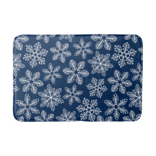 Sneeuwvlokken op donkerblauw badmat