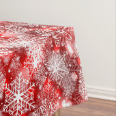 Sneeuwvlokken op rood tafelkleed (Voorbeeld)