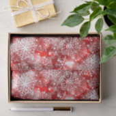 Sneeuwvlokken op rood tissuepapier (Geschenk)