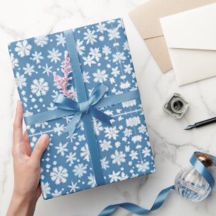 Sneeuwvlokken repeating patroon wit blauw cadeaupapier