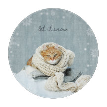 Snijplank, winterkat laat het sneeuwen