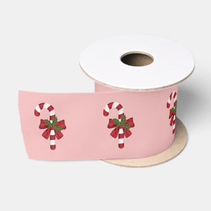 Snoepstokje Met Een Strik En Kersthulst Op Roze Lint