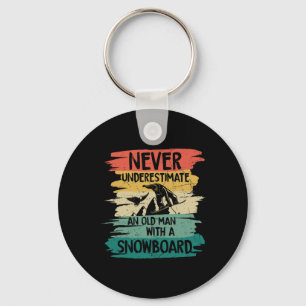 Snowboarden onderschat nooit een oud Man met een Sleutelhanger