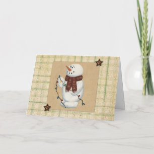 Snowman avec la carte de Noël