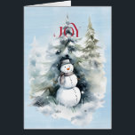 Snowman dans la forêt avec Red JOY<br><div class="desc">Une belle image d'un bonhomme de neige dans la forêt avec une JOIE rouge vif qui vous tend la main. Le tout sur un arrière - plan d'aquarelle bleu. A l'intérieur,  HAPPY HOLIDAYS en rouge et Best Wives pour le Nouvel An en noir</div>