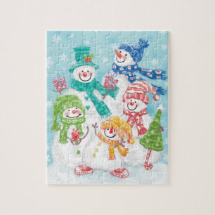 Snowman-familie in de sneeuw legpuzzel