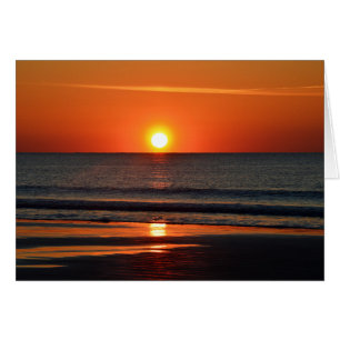 Soleil orange sur la plage