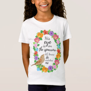 Son oeil est sur le T-shirt des filles du moineau