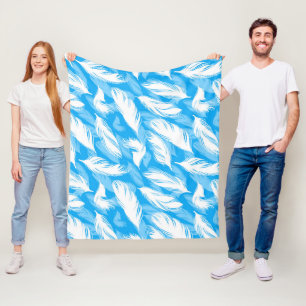 Sophisticated Feather Design On A Bright Blue Fleece Deken