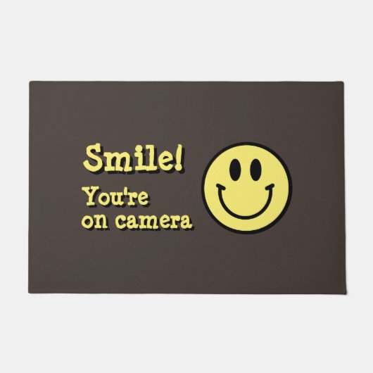 Souriez ! Tu es filmé ! Tapis (Devant)