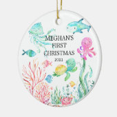 Sous le premier ornement de Noël du bébé de mer (Gauche)