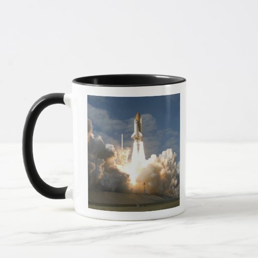 Space Shuttle Atlantis tilt af 24 Mok (Links)