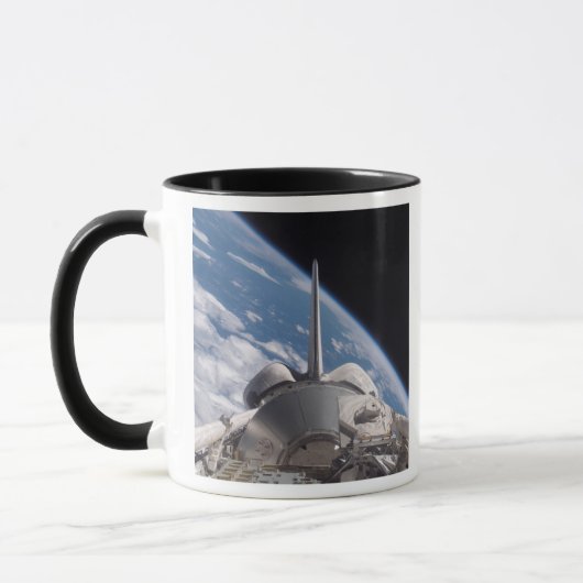 Space Shuttle Discovery door Aarde teruggeworpen Mok (Links)