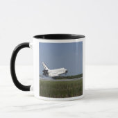 Space shuttle Discovery landt op Runway 33 4 Mok (Links)