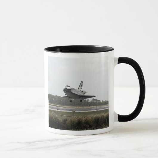 Space Shuttle Discovery-naderingen bij landing Mok (Rechts)
