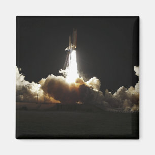 Space shuttle Discovery tilt uit Magneet