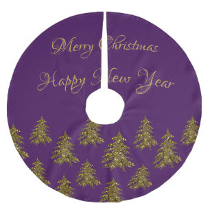 Sparkly gouden kerstboom op paarse kerst rok