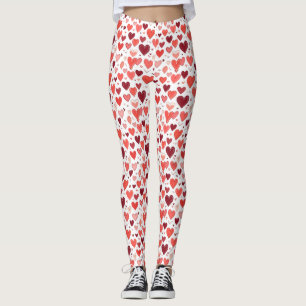 Speelse hand getekende rode harten patroon op wit leggings