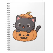 Speelse zwarte kat die uit pompoen T-shirt springt Notitieboek (Voorkant)